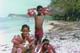 Abiona, Dalero, Malaika, on back - Berkeley kids being hit by sun - Barbados beach 1977