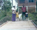 errol, lynette, abby, malaika, dalero, on back - view of folks & house from bridge