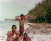 Abiona, Dalero, Malaika, on back - Berkeley kids being hit by sun - Barbados beach 1977