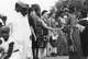 Stella, on back - Q.A.C. Speech Day - June 14, 1975 L. to R. Two male teachers, Mrs. Elhhetih, Mrs. Lacey, Mde De Nehludoff, Y.T., Mrs. Bisade, Mrs. Abdullehi - principal - and Mrs. Abbe Kyari - wife of the then Governor of Keduna State