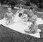 In side yard at AMC and RLC Jrs first house on Alden Road in Rosslyn Farms. Left to Right- JPC, Kathy Helm, WWC, Jackie Wilson