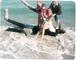 ray van elaine bill on driftwood in florida christmas 1979 - heads chopped